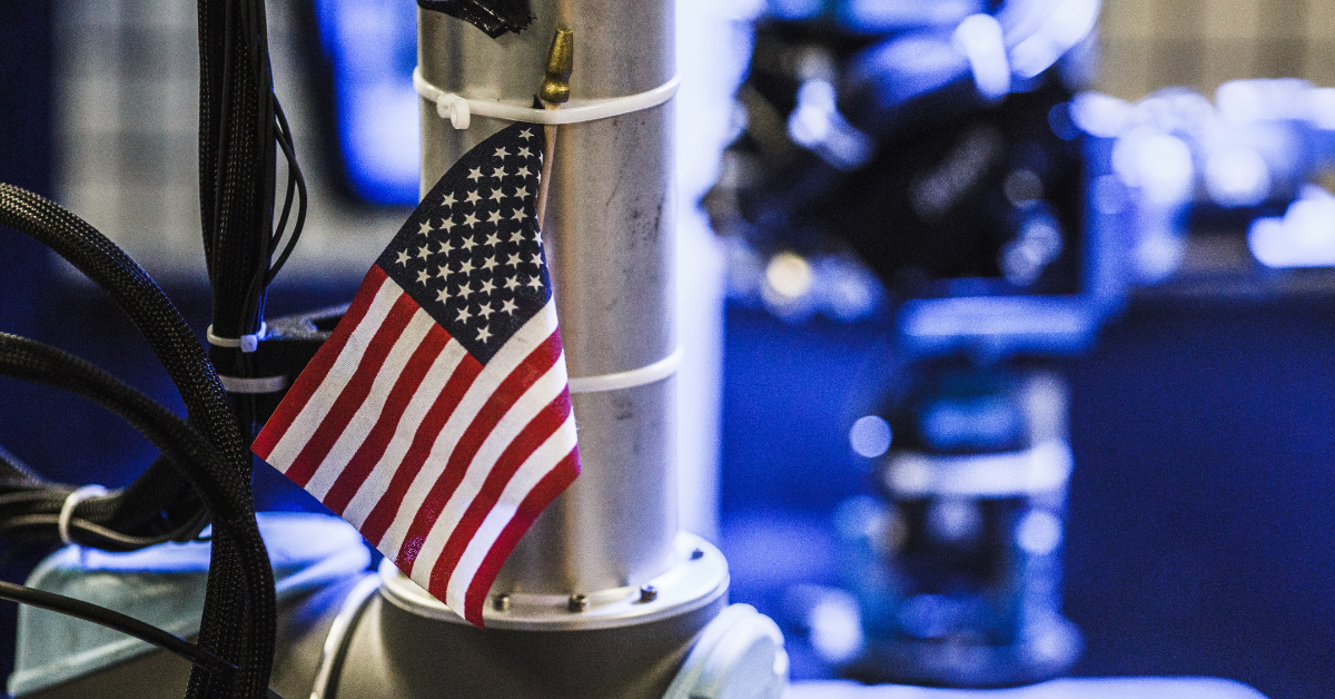 Close up of an American flag attached to production equipment